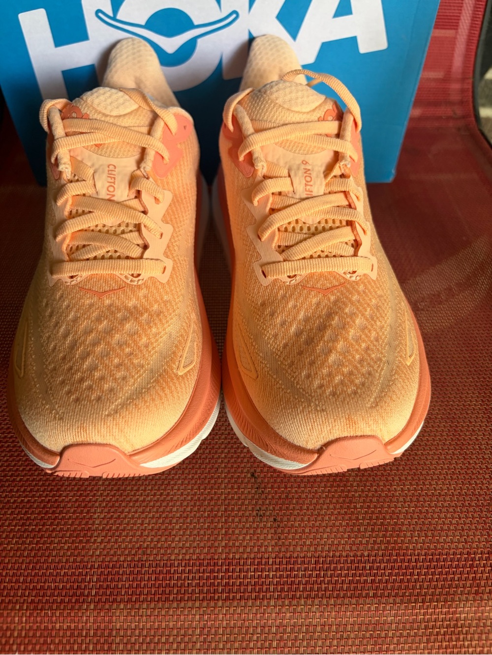Hoka  Clifton 9 Women's Athletic Shoes in Peach-Orange size 5.5 B